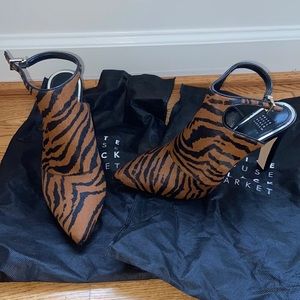 Selling brand new, never worn, animal printed heels.